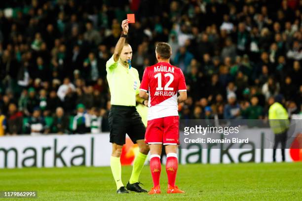 Referee Jerome BRISARD give a red car Ruben AGUILAR of Monaco during the Ligue 1 match between AS Saint-Etienne and AS Monaco at Stade...