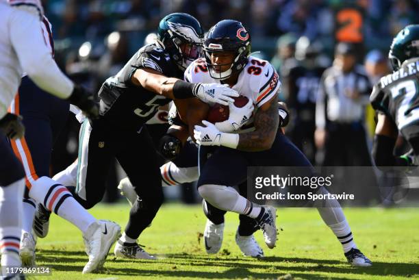 Philadelphia Eagles Linebacker Kamu Grugier-Hill tackles Chicago Bears Running Back David Montgomery on a carry in the first half during the game...