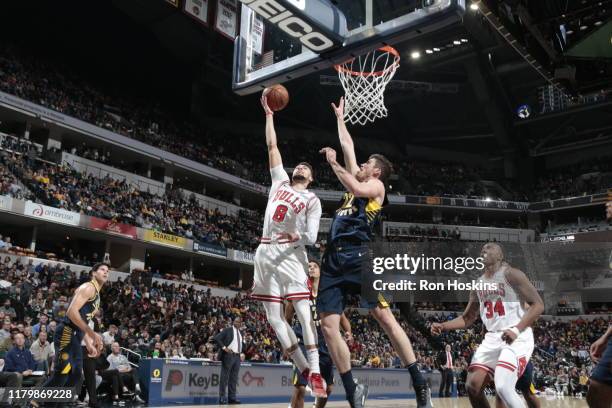 Zach LaVine of the Chicago Bulls shoots the ball against T.J. Leaf of the Indiana Pacers on November 3, 2019 at Bankers Life Fieldhouse in...