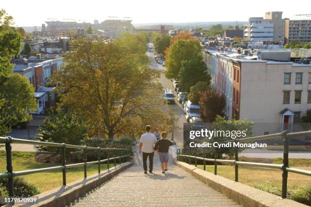 people exploring federal hill - baltimore maryland landscape stock pictures, royalty-free photos & images