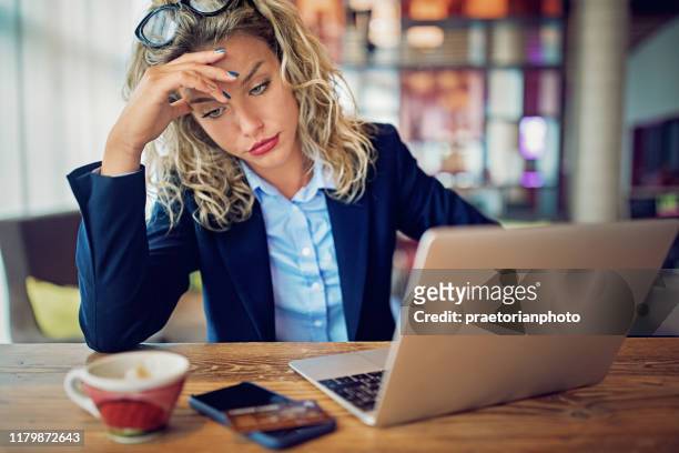 burnout businesswoman with debt problems - bullying workplace stock pictures, royalty-free photos & images