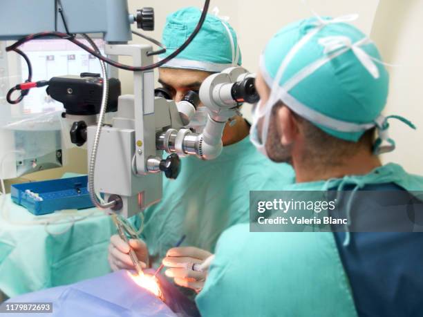 eye operation in the operating room - micro surgery stock pictures, royalty-free photos & images
