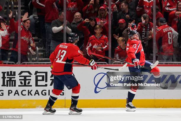 Jakub Vrana of the Washington Capitals celebrates after scoring his third goal of the game for a hat trick in the second period against the Calgary...