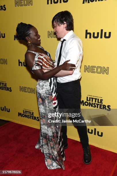 Lupita Nyong'o and Abe Forsythe attend the New York Premiere "Little Monsters" at AMC Lincoln Square Theater on October 08, 2019 in New York City.