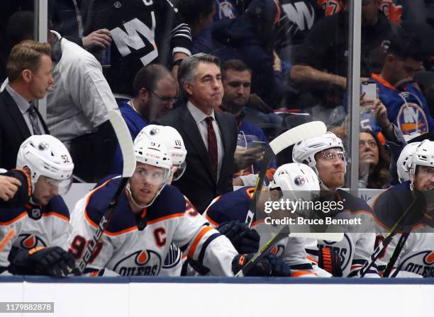 Head coach Dave Tippett of the Edmonton Oilers handles bench duties against the New York Islanders at NYCB's LIVE Nassau Coliseum on October 08, 2019...