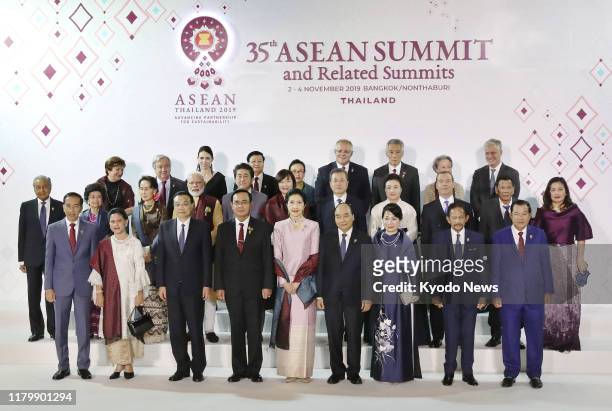 Leaders pose in a photo session on the outskirts of Bangkok on Nov. 3 for ASEAN related summits.
