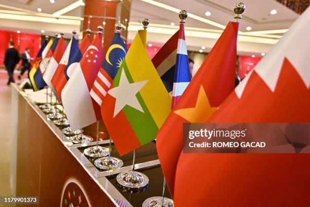 The national flags of the various countries attending the 35th Association of Southeast Asian Nations Summit are displayed in Bangkok on November 4,...