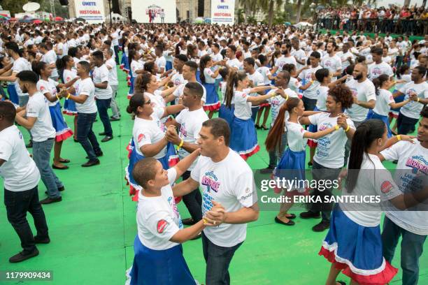 Some 427 Dominican couples dance to achieve a Guinness world record of couples dancing merengue, in Santo Domingo, Dominican Republic, on November 3,...