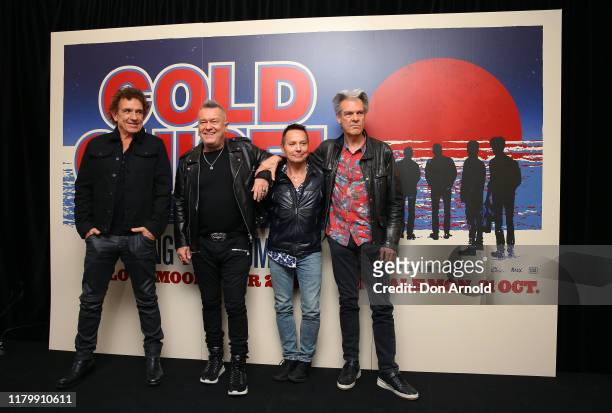 Ian Moss, Jimmy Barnes, Phil Small and Don Walker from Cold Chisel pose during a press conference on October 09, 2019 in Sydney, Australia.