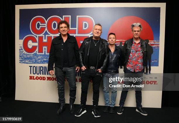 Ian Moss, Jimmy Barnes, Phil Small and Don Walker from Cold Chisel pose during a press conference on October 09, 2019 in Sydney, Australia.