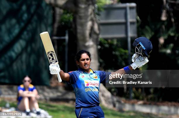 Chamari Athapaththu of Sri Lanka celebrates scoring a century during Game 3 of the One Day International Series between Australia and Sri Lanka at...