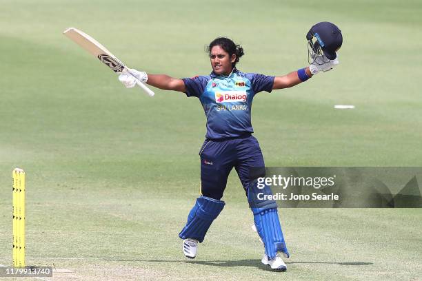 Chamari Athapaththu of Sri Lanka celebrates making 100 runs during Game 3 of the One Day International Series between Australia and Sri Lanka at...