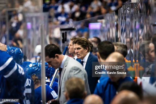 Toronto Maple Leafs head coach Mike Babcock looks on from the bench against the St. Louis Blues during the second period at the Scotiabank Arena on...