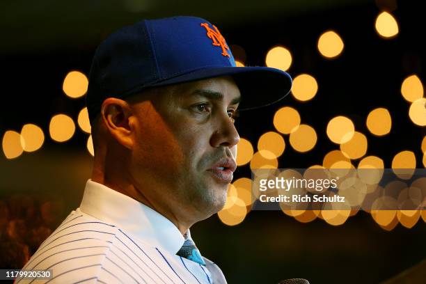Carlos Beltran talks to the media after being introduced by as the manager of the New York Mets during a press conference at Citi Field on November...