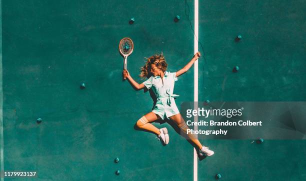 modern tennis girl - warm up exercise stock-fotos und bilder