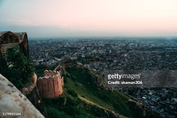 beautiful sunset landscape of nahargarh fort  ancient mughal walls and palace located middle of   jaipur india - akbar's tomb stock pictures, royalty-free photos & images