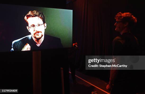 November 2019; Paddy Cosgrave, CEO & co-founder, Web Summit, watches Edward Snowden, President, Freedom of the Press Foundation, on Centre Stage...