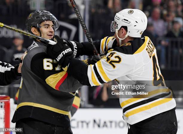 Max Pacioretty of the Vegas Golden Knights and David Backes of the Boston Bruins grab each other in the third period of their game at T-Mobile Arena...