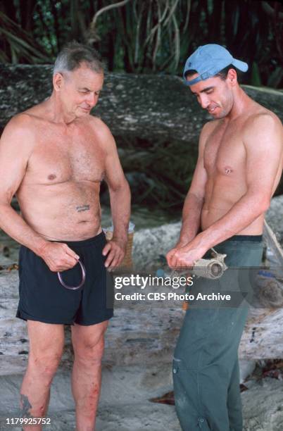 Contestants, left to right, Rudy Boesch, a 72-year-old retired Navy SEAL from Virginia Beach, and Sean Kenniff from Long Island, NY, are on Pulau...