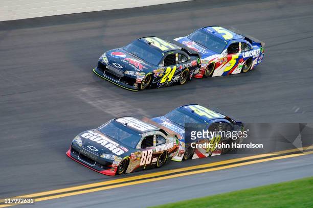 Dale Earnhardt Jr., driver of the National Guard Heritage/Amp Energy Chevrolet, Jeff Gordon, driver of the Pepsi Max Chevrolet, Jimmie Johnson,...