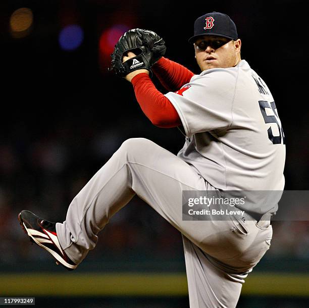 Pitcher Bobby Jenks throws in the eighth inning against the Houston Astros at Minute Maid Park on July 2, 2011 in Houston, Texas. Boston won 10-4.