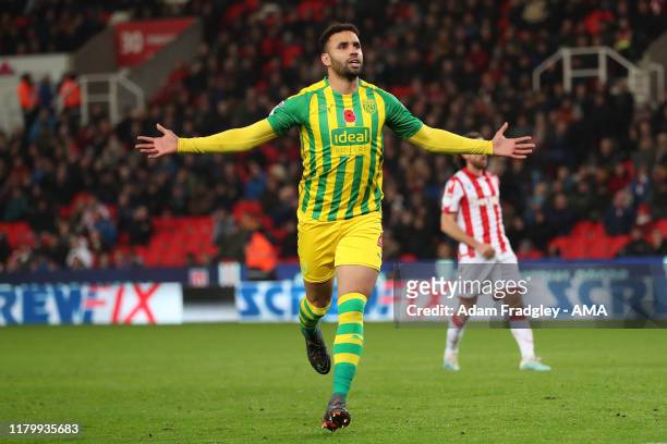 Hal Robson-Kanu of West Bromwich Albion scores a goal to make it 0-2 from the penalty spot during the Sky Bet Championship match between Stoke City...