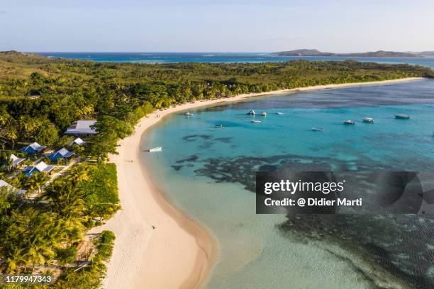 aerial view of the stunning blue lagoon beach in the yasawa island in fiji - yasawa island group stock pictures, royalty-free photos & images