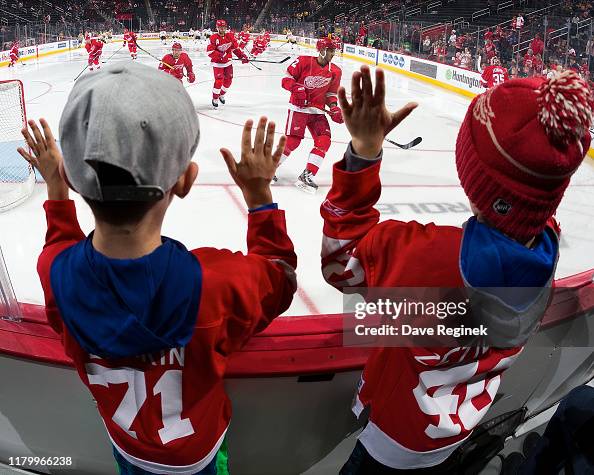 Bennett Roeske Young fans Bennett and Rudy Roeske of Macomb, Michigan cheer from the ...