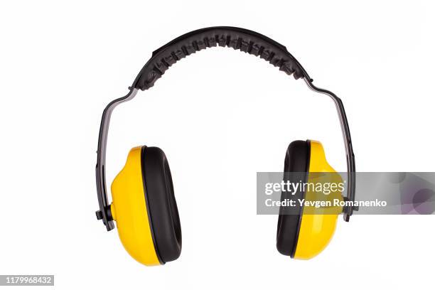 hearing protection yellow ear muffs, personal protective equipment, safety equipment isolated on white background - orejeras fotografías e imágenes de stock