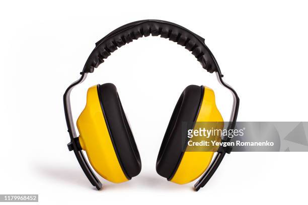hearing protection yellow ear muffs, personal protective equipment, safety equipment isolated on white background - orejeras fotografías e imágenes de stock