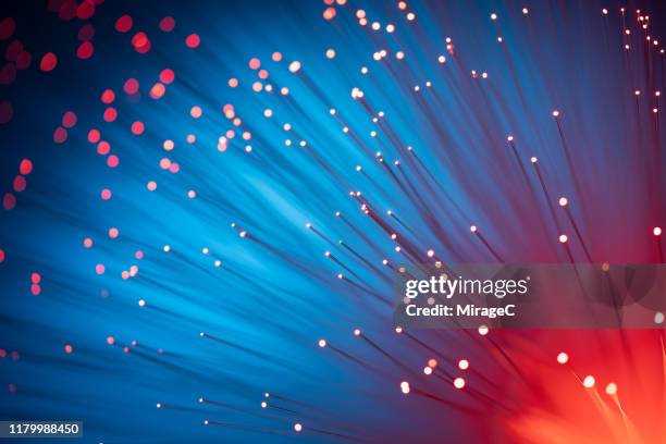 illuminated fiber optics abstract background - macro stock-fotos und bilder