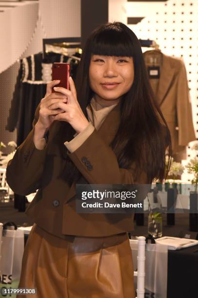 HsinWei Ho attends the launch of the British Fashion Council designer pop-up store at Bicester Village on October 09, 2019 in Bicester, England.