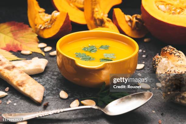 homemade pumpkin soup for autumn days - pumpkin soup stock pictures, royalty-free photos & images