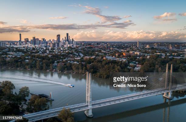 aerial view of brisbane from st lucia suburb at sunset - brisbane stockfoto's en -beelden