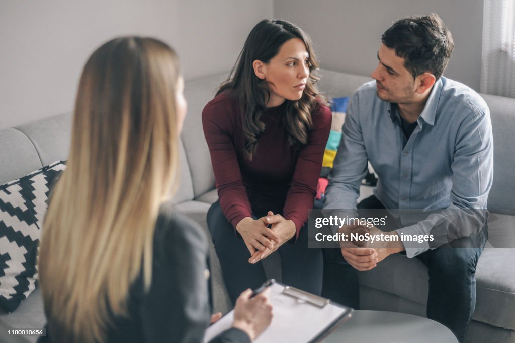 Expecting couple on home counselling meeting