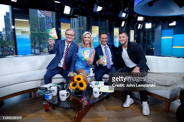 Fox anchors Steve Doocy, Ainsley Earhardt, Jillian Mele and Brian Kilmeade are joined by Professional baseball player Tim Tebow during "Fox &...
