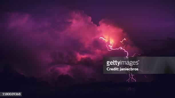 thunderstor. - purple sky stock pictures, royalty-free photos & images