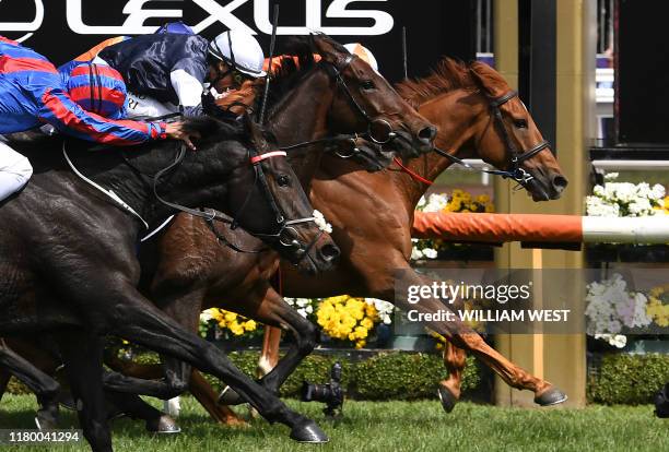 Jockey Craig Williams onboard Vow and Declare wins the Melbourne Cup horse race in Melbourne on November 5, 2019. / -- IMAGE RESTRICTED TO EDITORIAL...