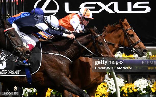 Jockey Craig Williams onboard Vow and Declare wins the Melbourne Cup horse race in Melbourne on November 5, 2019. / -- IMAGE RESTRICTED TO EDITORIAL...