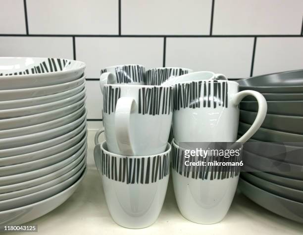 crockery, porcelain, white utensils and other different stuff on shop - porcelana china stock pictures, royalty-free photos & images