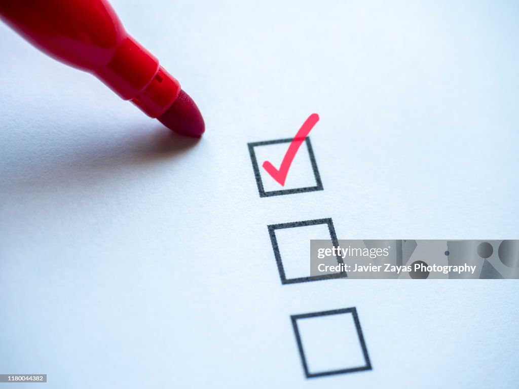 Check Mark In Checklist Box On White Background