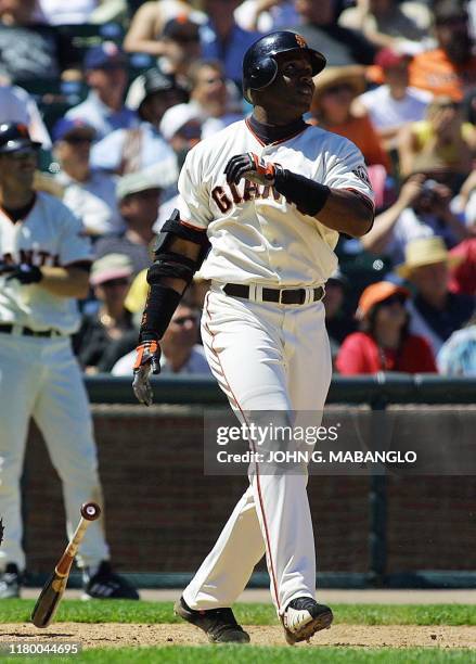 San Francisco Giants slugger Barry Bonds watches his two-run home run to center field against the San Diego Padres 07 June 2001 in San Francisco,...