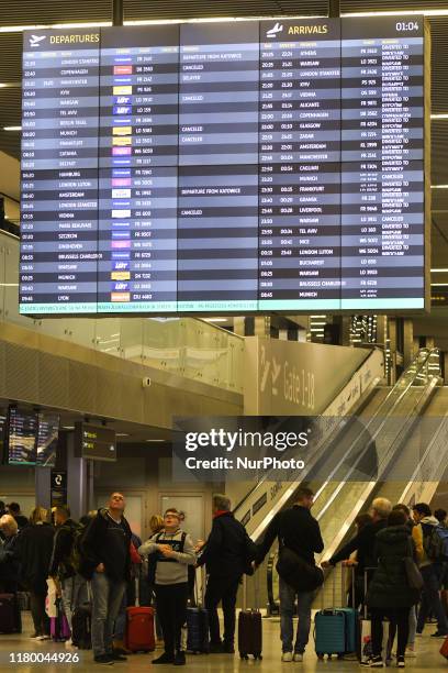 General view of the Departure Screen with cancelled, delayed and diverted flights from Krakow airport on 23rd October 2019. Fog at Krakow Airport...