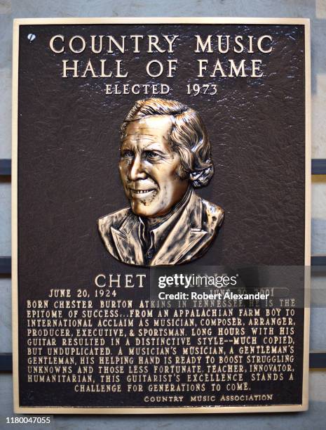 An bronze plaque honoring Chet Atkins as a member of the Country Music Hall of Fame on display at the Country Music Hall of Fame and Museum in...
