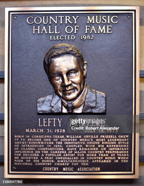An bronze plaque honoring Lefty Frizzell as a member of the Country Music Hall of Fame on display at the Country Music Hall of Fame and Museum in...