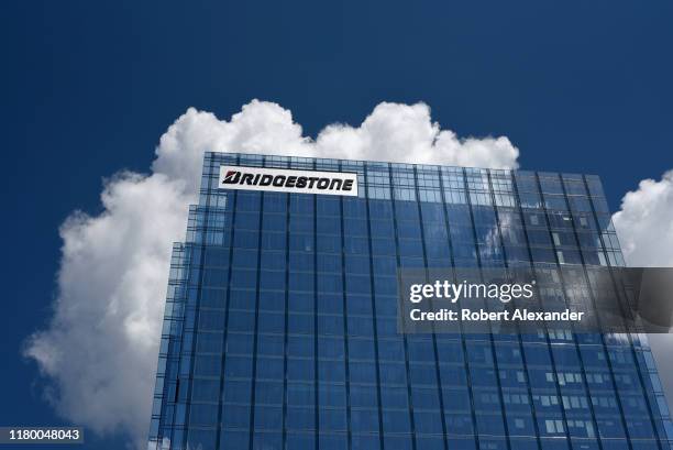 Cumulus clouds frame Bridgestone Tower in downtown Nashville, Tennessee. The skyscraper is headquarters of Bridgestone Americas, a subsidiary of...