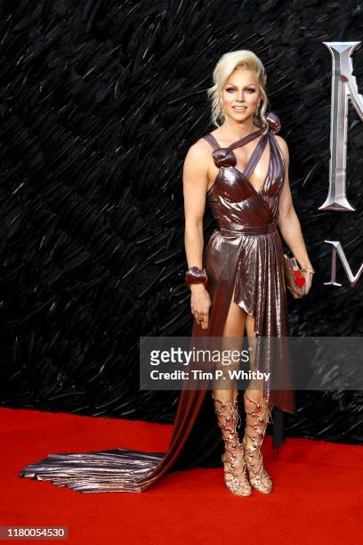 Courtney Act attends the European premiere of "Maleficent: Mistress of Evil" at Odeon IMAX Waterloo on October 09, 2019 in London, England.