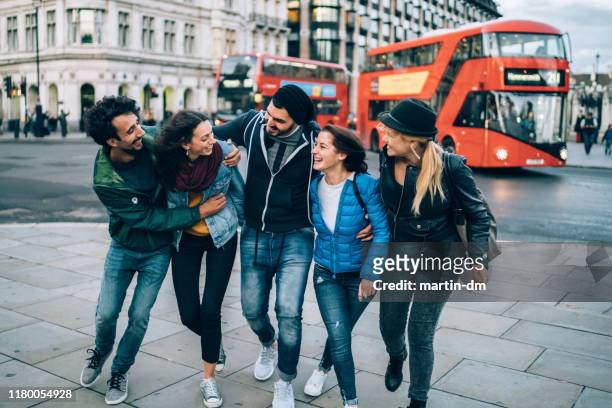 friends hanging out in uk - central london stock pictures, royalty-free photos & images