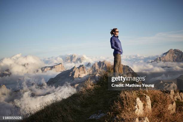 mountain peak woman - topwoman stock pictures, royalty-free photos & images
