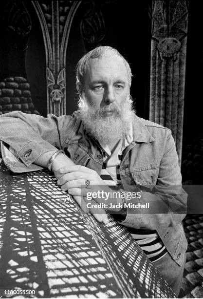 Portrait of American artist and author Edward Gorey on the set he designed for the Broadway revival of 'Dracula' at the Martin Beck Theatre, New...